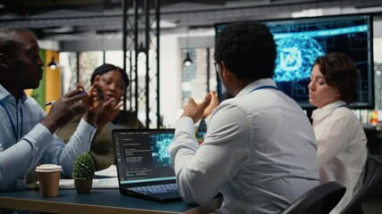 System administrators working in AI startup training predictive models for language processing tasks. Machine learning tech experts use technical expertise for complex IT requirements, camera A