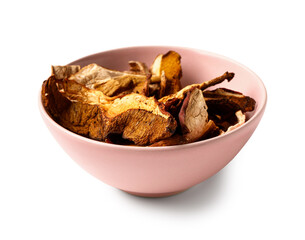 Pink bowl with tasty dried mushrooms on white background
