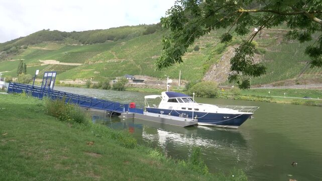 Scenic view of a pleasure boat moored near a bridge in Trittenheim