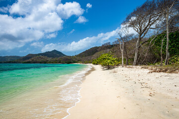 View of tropical white sand beach and Point Cistern on Carriacou, Grenada in the Caribbean