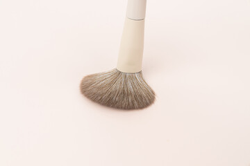 Close-Up of Soft Makeup Brush on Pastel Background