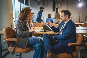 Fototapeta premium Business professionals discussing strategy during an office meeting