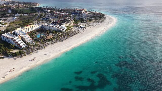 Aerial View of Eagle Beach, Aruba: White Sand, Turquoise Water, and Fofoti Trees.
