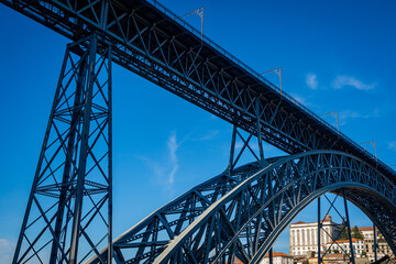 Obraz premium Abstract view of the city Porto with Luis I Bridge of the Douro River in Portugal