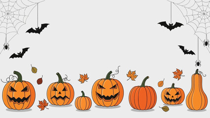 A collection of spooky carved Halloween pumpkins with evil faces.