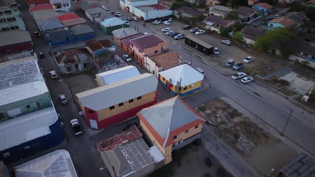 4K 60FPS Video: San Nicolas Town (St. Theresa Church) Contrast with Aruba Refinery.