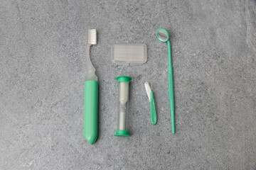 Braces orthodontics kit on gray granite