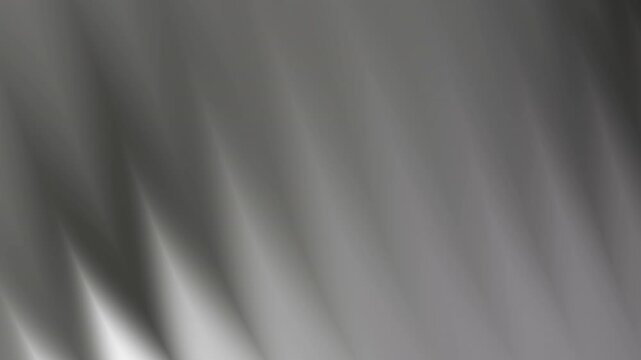 Gray background with diagonal light streaks. Suitable for digital design projects, advertisements, website backgrounds, and abstract concepts.