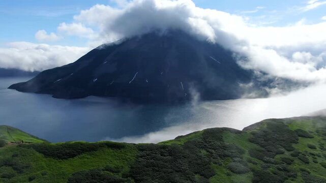 Flight over the caldera of the extinct volcano Lion's Mouth, Iturup Island, Kuril Islands