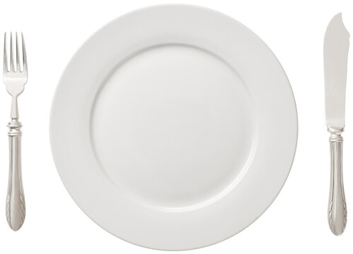 white plate, fork, and knife
