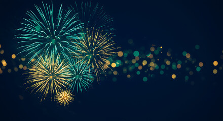 Teal and Gold Fireworks with Bokeh on Dark Blue Background