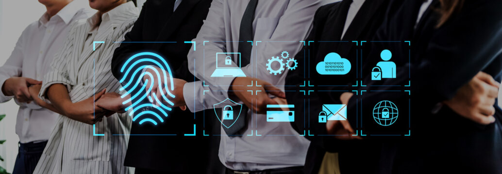 Diverse group of professionals standing together with digital security icons overlay representing technology, identity protection, and teamwork in modern business setting. Trope. - Powered by Adobe