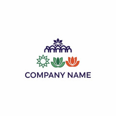 A logo featuring a crown-like arch, an eight-pointed star, and two lotus flowers in green and orange, with 