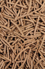 High fibre bran sticks breakfast cereal background texture detail