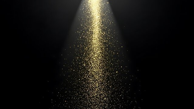 Ethereal cascade of sparkling gold glitter in a light beam.