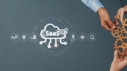 This image captures collaboration in cloud technology, showcasing hands assembling gears with SaaS icons, symbolizing digital innovation and transformative business solutions. Raster