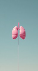 Pink lungs float on a thin stem against a clear, bright, pale blue sky