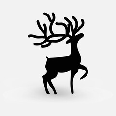 Bold black silhouette of deer standing with one leg raised and large highly stylized antlers This graphic design is perfect for logos emblems or Christmas and nature-themed decor Vector