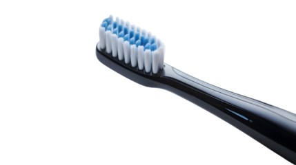 Extreme close up of a modern black toothbrush head with blue and white bristles