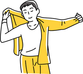 上着を着る男性