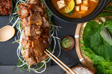 Authentic Korean Bossam Platter with Steamed Rice and Accompaniments