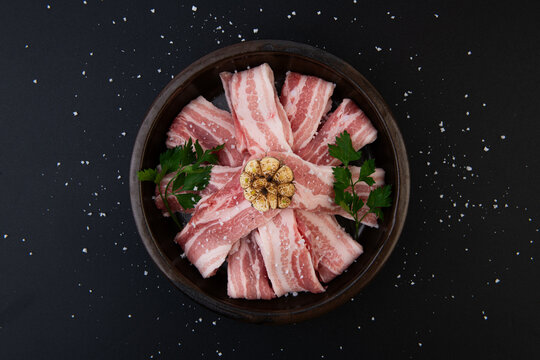 Premium Raw Pork Belly Slices with Roasted Garlic and Salt