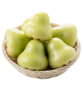 A green rose apple on a woven bowl, white background isolated