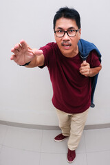 Top view shot of man reaching out with right hand