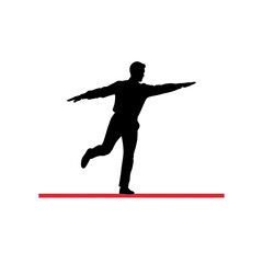 Silhouette of a Man Balancing on One Leg with Arms Extended.