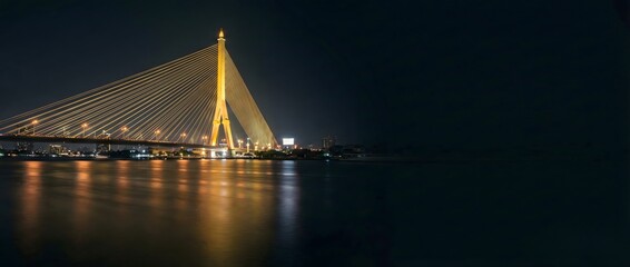 Obraz premium Illuminated Rama VIII Bridge at Night in Bangkok, Thailand