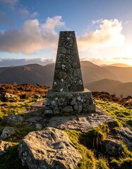 Summit Marker on a Mountain Peak at Sunset, Ireland.