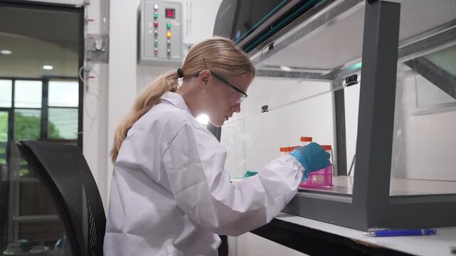 Laboratory technicians analyzing samples in a modern research facility during daytime
