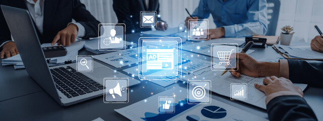 A captivating scene of a business meeting where professionals brainstorm digital marketing strategies, featuring modern technology and collaboration elements. Trope