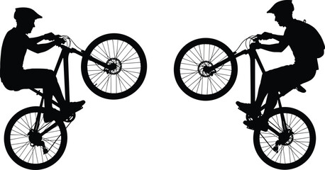 ilhouette of cyclists performing wheelie tricks on mountain bikes, extreme riding action demonstrating balance, control, sport skills and outdoor freestyle movement
