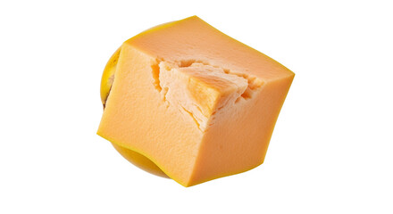 Elevated block of gourmet cheese reveals its delectable texture against a crisp backdrop of white providing an appealing image of culinary art