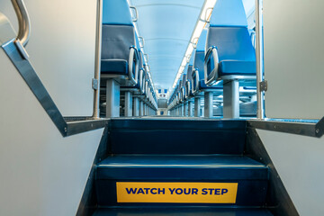 Warning sign on train steps