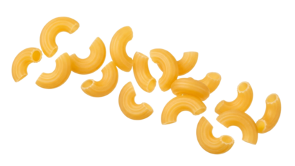 Scattered macaroni elbows on a pristine white background, highlighting the classic pasta shape and golden hue for culinary applications