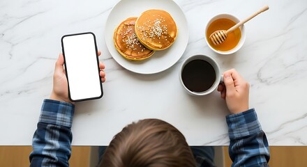 Young woman holding coffee in cafe with laptop and tablet on table, mock up