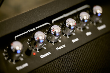 Amplifier with control knobs close up