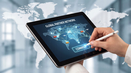 Hand Using Tablet to Access Global Logistics Connection Interface