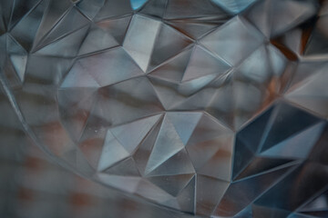 abstract fractal background. texture resembles cut glass, crystal, or a diamond surface, perfect for luxury, technology, and futuristic designs.