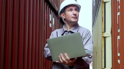 Logistics manager using laptop in shipping yard industrial environment action shot urban setting - Powered by Adobe