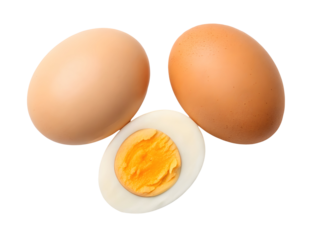 Two whole eggs and one halved egg isolated on a transparent background