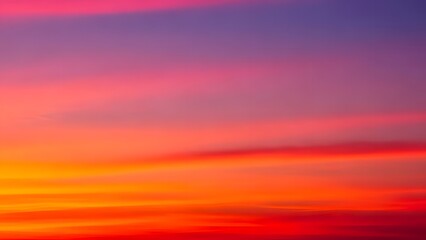 Highly vibrant and intense abstract depiction of a sunset or sunrise sky, featuring rich, smooth color gradients from deep red and fiery orange at the bottom to hot pink and purple at the top.