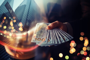 Business executive in formal suit giving money as a bribe. Double exposure skyscraper