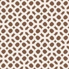 Seamless geometric pattern with brown abstract shapes on beige background