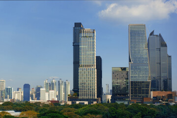 View of Bangkok city skyline from Dusit Arun, a popular new sky garden or rooftop park located at Dusit Central Park, Thailand.