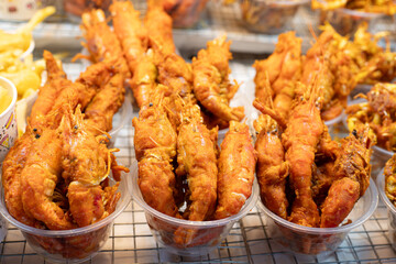 Fried river prawns in the market