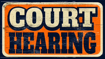 Aged and worn court hearing sign on wood