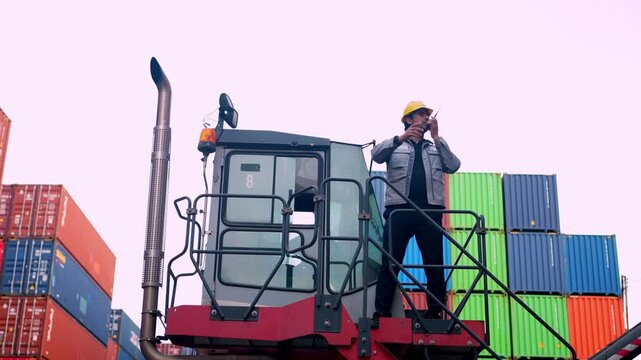 Construction worker directs operations amidst cargo containers shipping yard photo series urban setting aerial view industrial activity